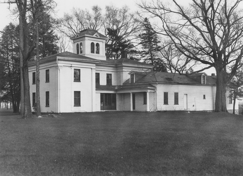 Prevel Hall on the campus of Saint Michael's College.  Stoehr lived for many years in a single room behind the dark French doors on the first floor.